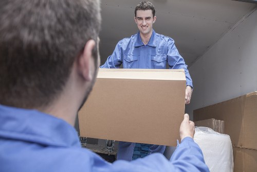 Removal team preparing a Bayswater home move with packed boxes and furniture