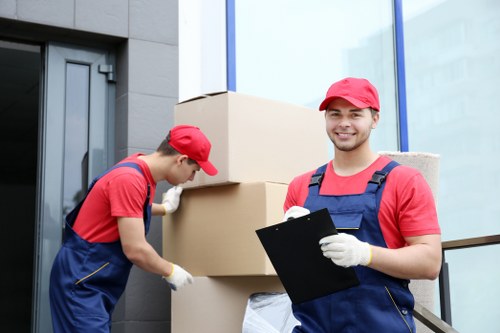 Removalists preparing for a home move in Bayswater with furniture and boxes