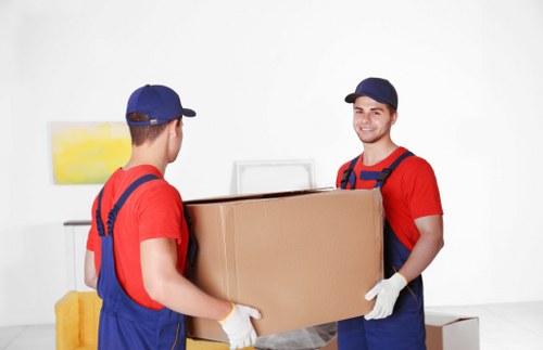 Team member reviewing ethical compliance documents for Man With Van Bayswater