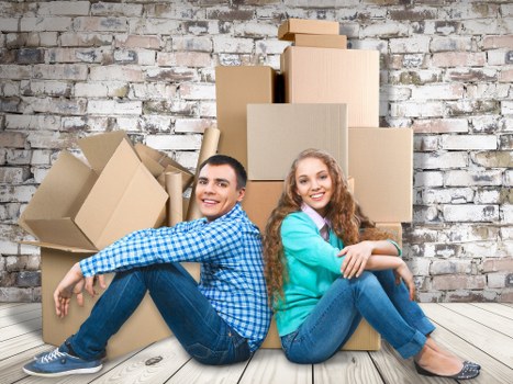Unpacking household items in a Bayswater property