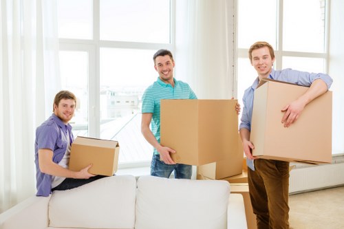 Business moving day with furniture, boxes, and equipment in Bayswater